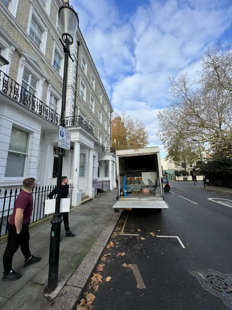 2 men and a luton van loading a van for a house move